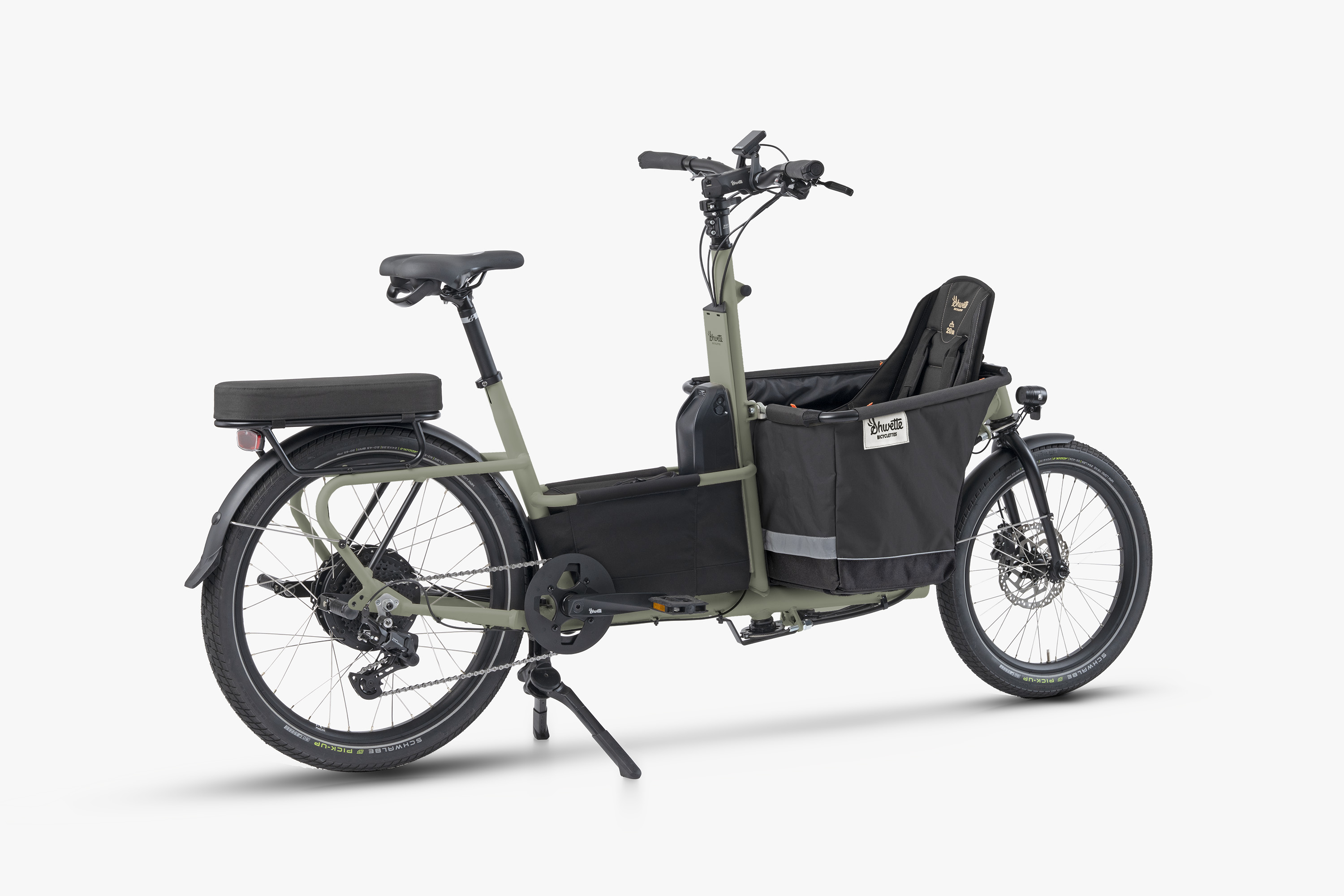 Photo du vélo Shwette Baggy en coloris vert avec sa caisse avant en coloris noir